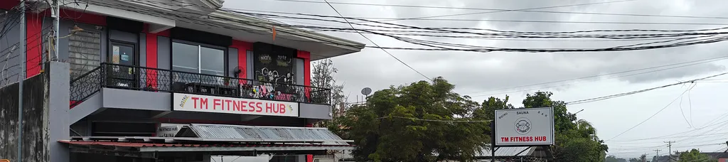 Contact banner for TM Fitness Hub in Valencia, Negros Oriental