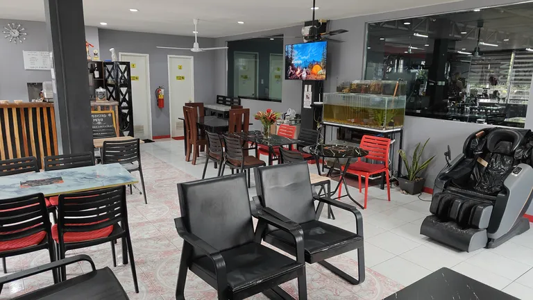Bistro seating area at TM Fitness Hub in Valencia, Negros Oriental